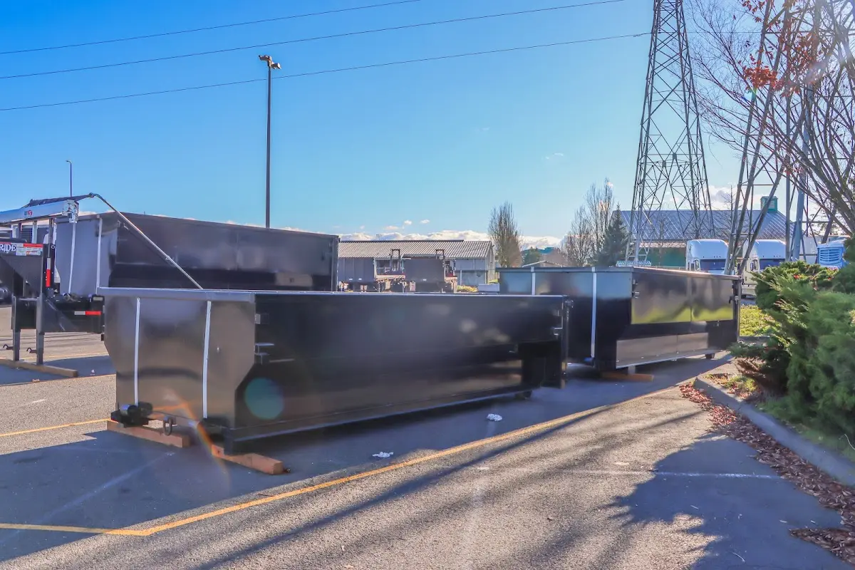 Roll-off dumpster ready for waste disposal at job site for 4 Yard Dumpster Rental in Paxton